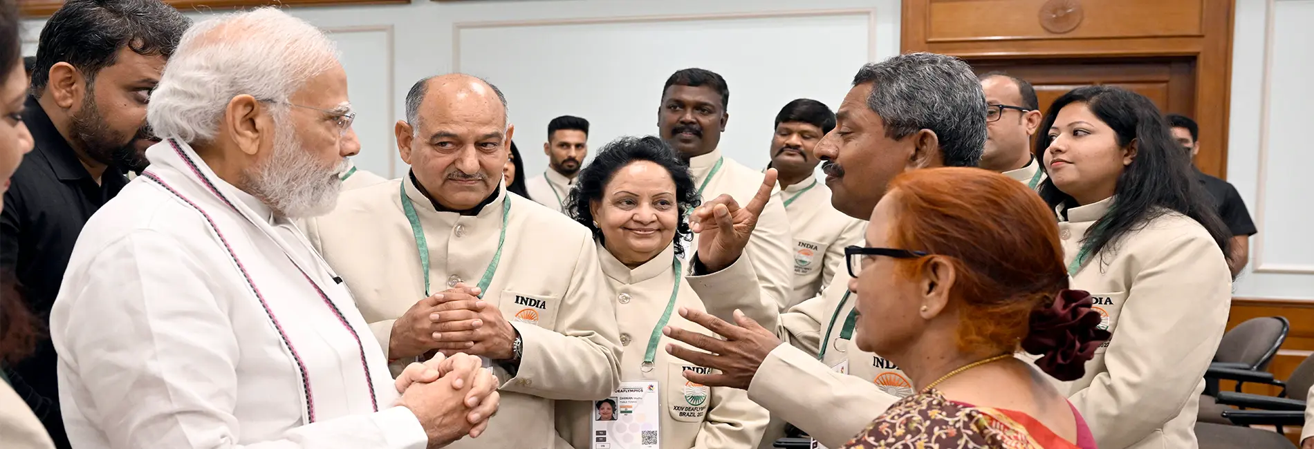 PM Shri Narendra Modi congratulating AISCD President Dr. Usha Punjabi, GS Mr. Suresh Kumar & Interpreter Gourav Verma for successful results in Deaflympics at Brazil, PM House, Delhi - 21 May 2022